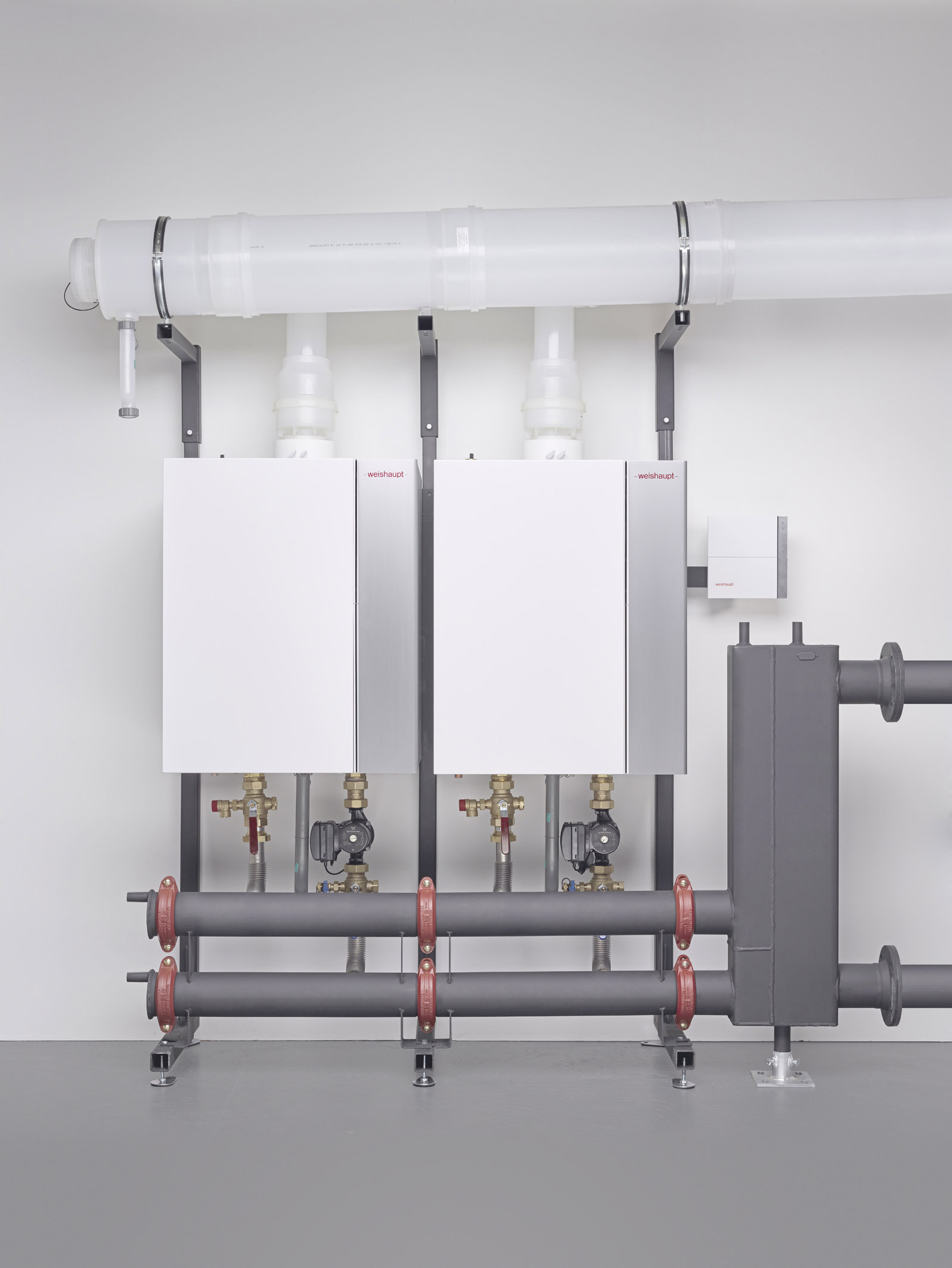 Fig.: Max Weishaupt GmbH - Impianto di caldaie a gas della ditta Weishaupt. L'assistenza caldaie a gas ad Aosta ﻿e Valle d'Aosta viene garantita dalla ditta Simonini Marco.